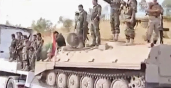 Peshmerga armor transporters headed for Kobane